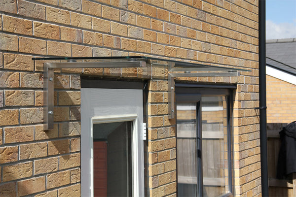 How does a door canopy improve your home?
