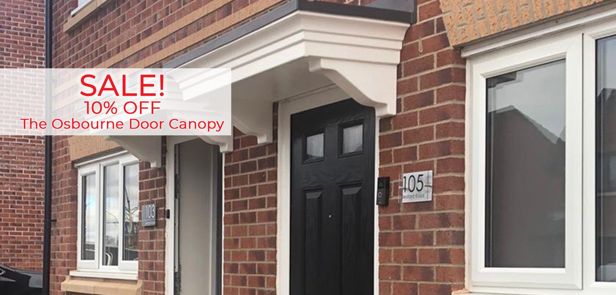 overdoor canopy above black front door of brick house with sale banner offering 10% off the osbourne door canopy